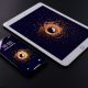 gold Apple iPad and black smartphone